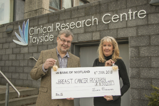 Tower of tablet brings £68,000 to cancer research